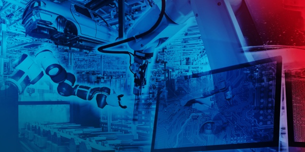 Automated automobile production with robots. In the foreground is a monitor on which the processes are simulated.