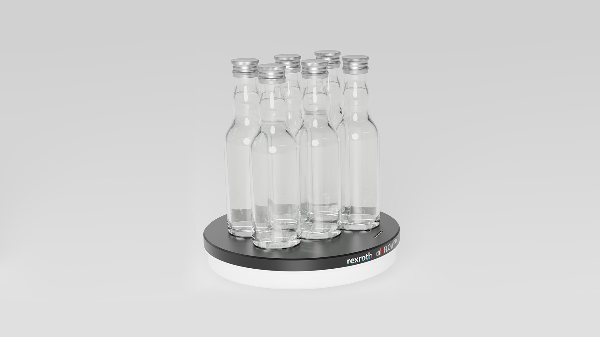 Workpiece carrier of the contactless planar system ctrlX FLOW6D, on which glass bottles are placed